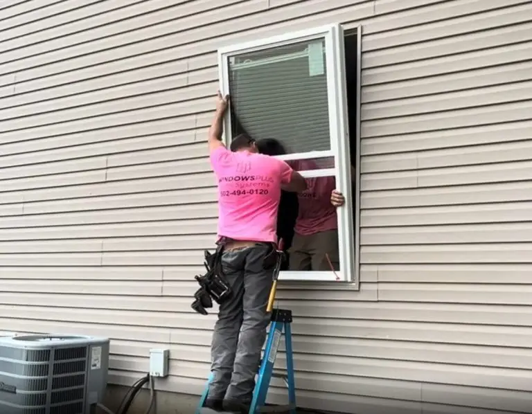 Window installation crew replacing a window in Louisville KY